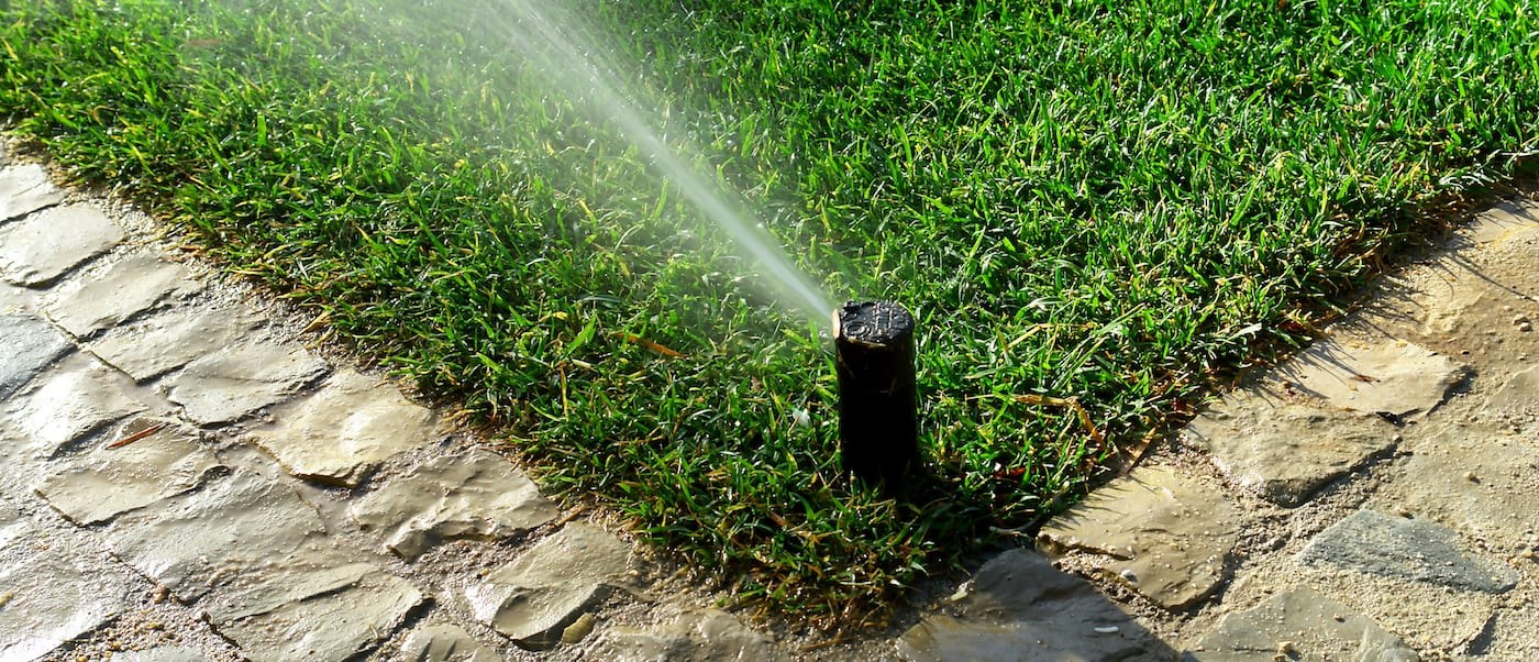 Irrigation system watering a lawn